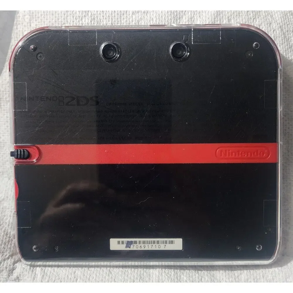2DS Console with [8] 2DS games, Box, and Plastic Case, Everything Works